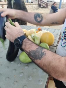 Wolf's hands preparing offerings